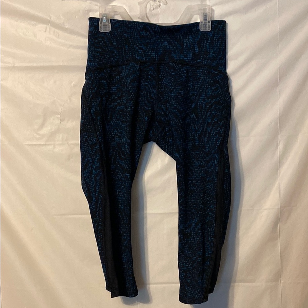Lululemon capris sz 6 in black & blue. Sheer material on bottom part of the leg